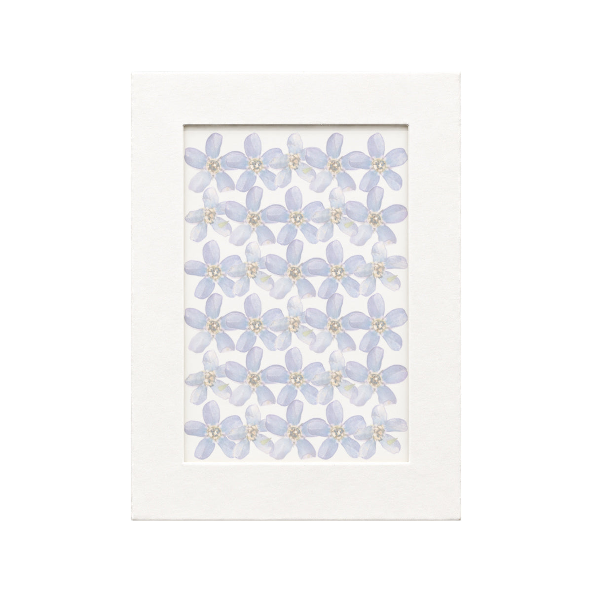 30 pressed Blue Star pieces in blue beneath translucent tracing paper
