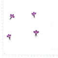 Purple pressed flower lobelia on a measurement grid