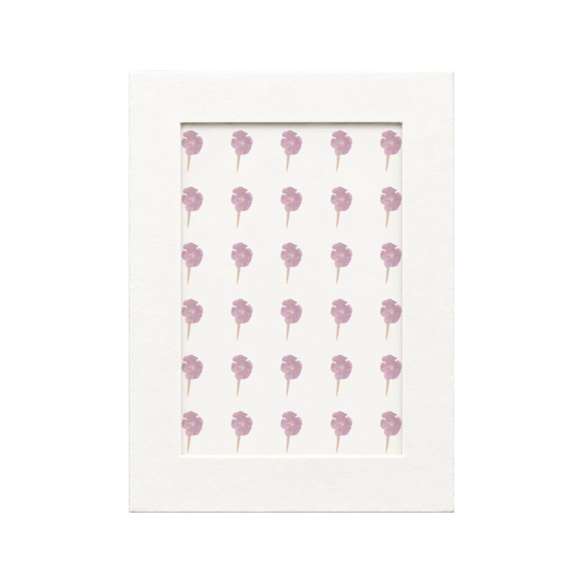 30 pressed Lantana pieces in purplish red beneath translucent tracing paper